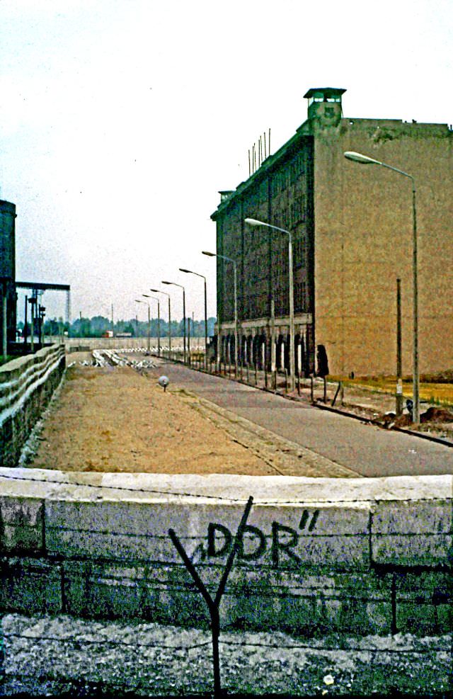 #77 The Berlin Wall as seen from Stresemannstraße in East Berlin, 1960s.