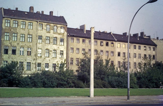 #78 Unrestored apartment buildings in East Berlin, 1960s.