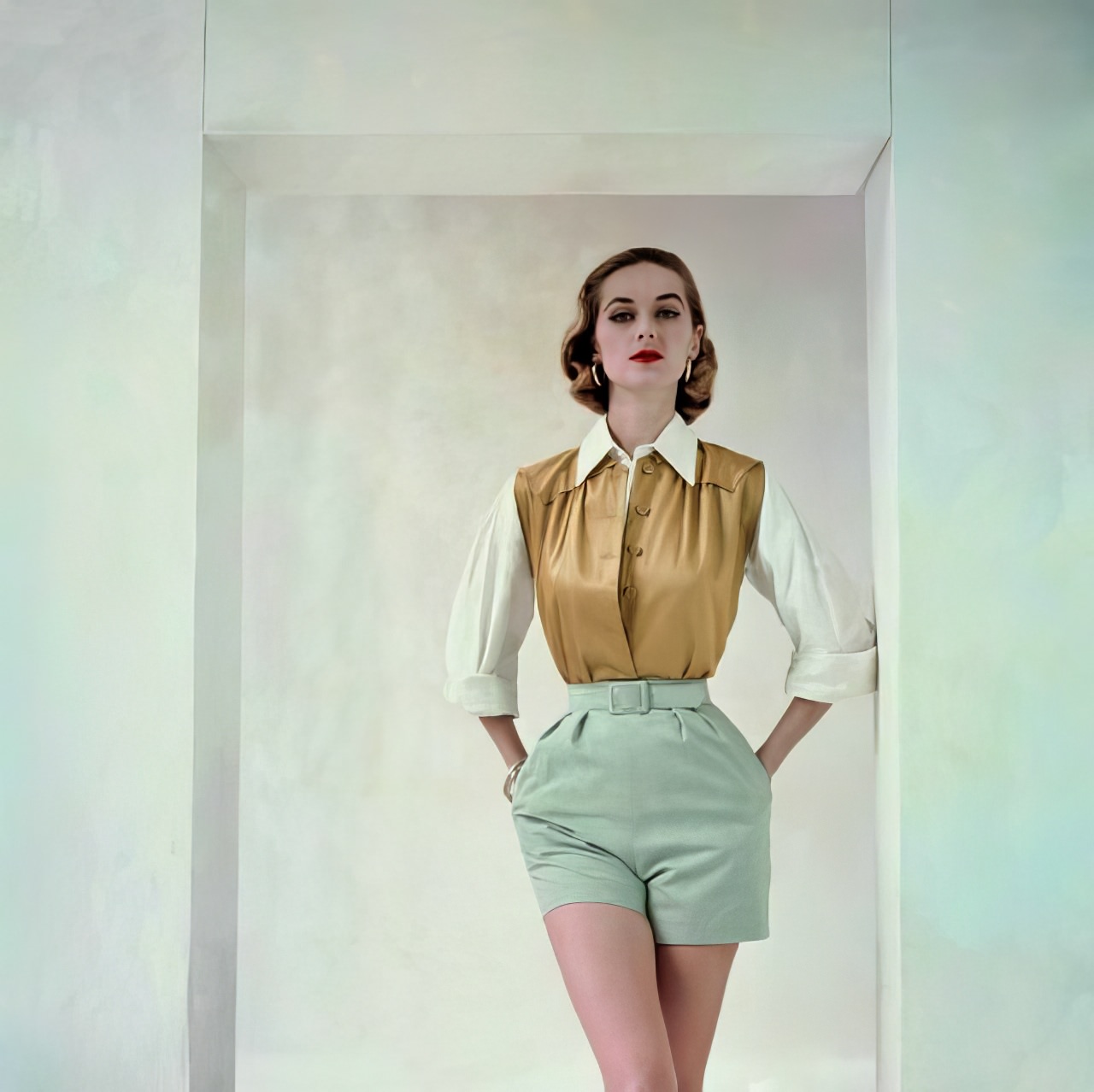 #16 Carol McCallson in gold, white, and aqua attire by Brigance of Sportsmaker, Glamour, April 1953.