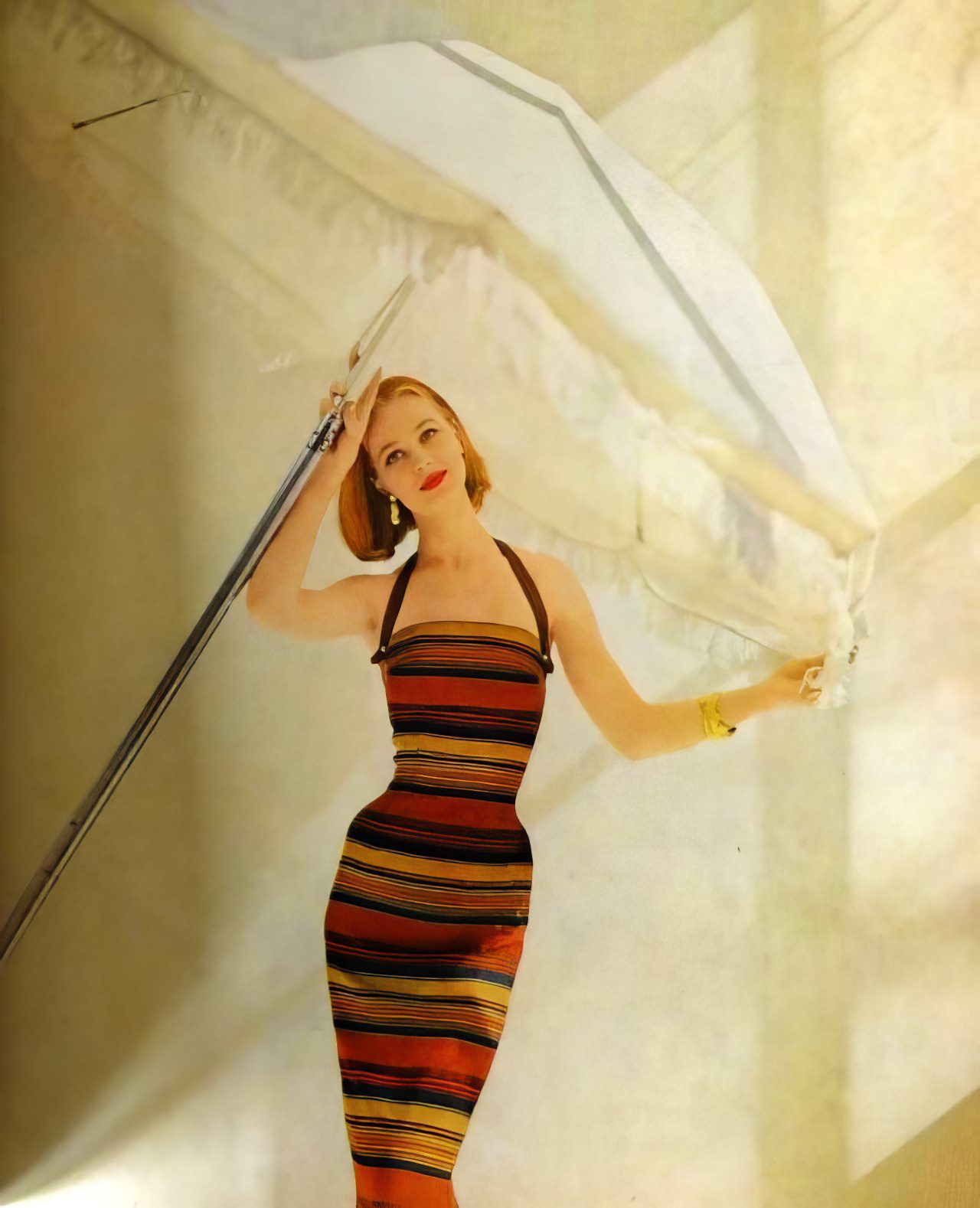 #18 Ann Klem in a colorful striped sheath by Mr. Mort, May 1956.