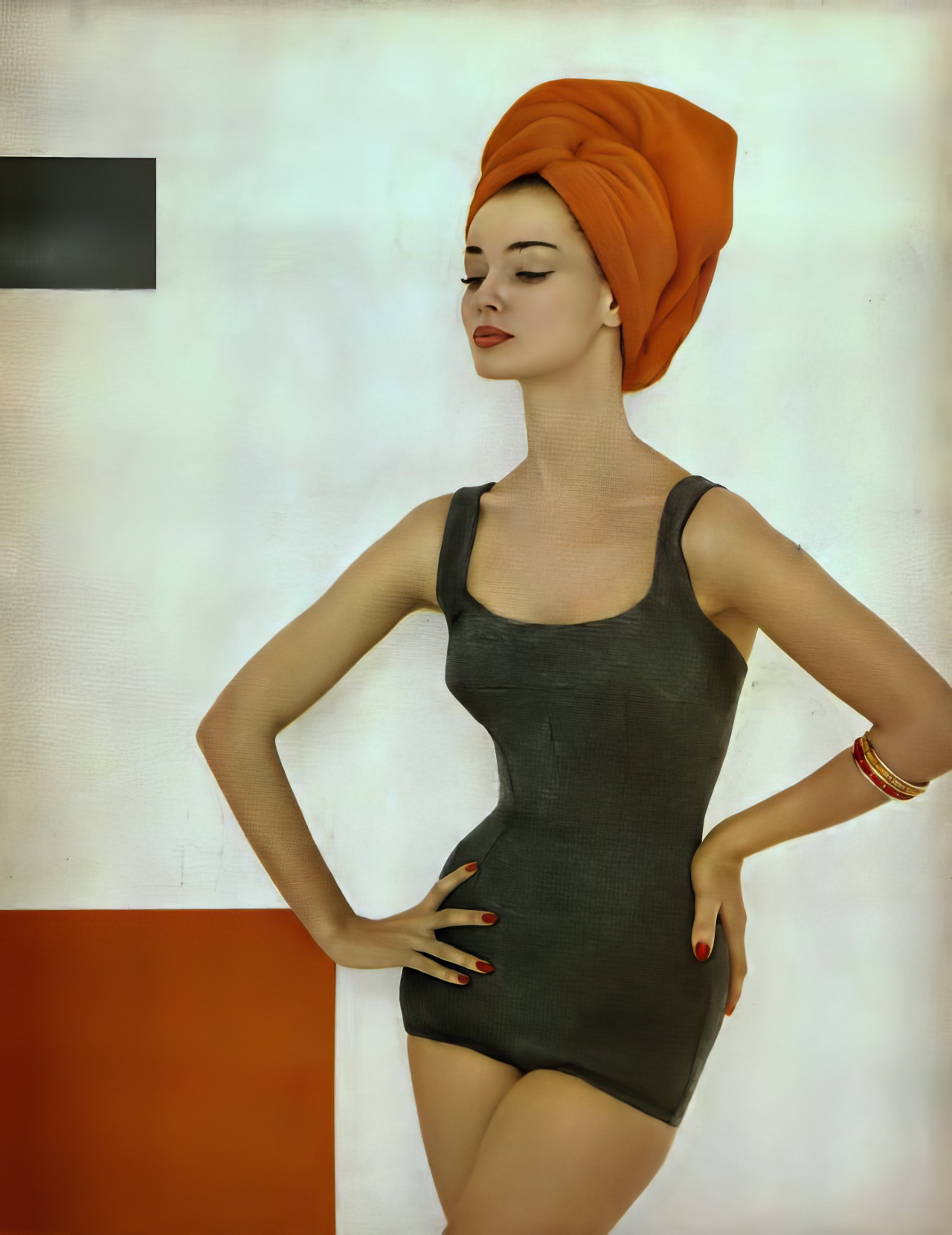 #22 Dolores Hawkins in a heathery jersey swimsuit by Maurice Handler of California, Harper’s Bazaar, June 1957.