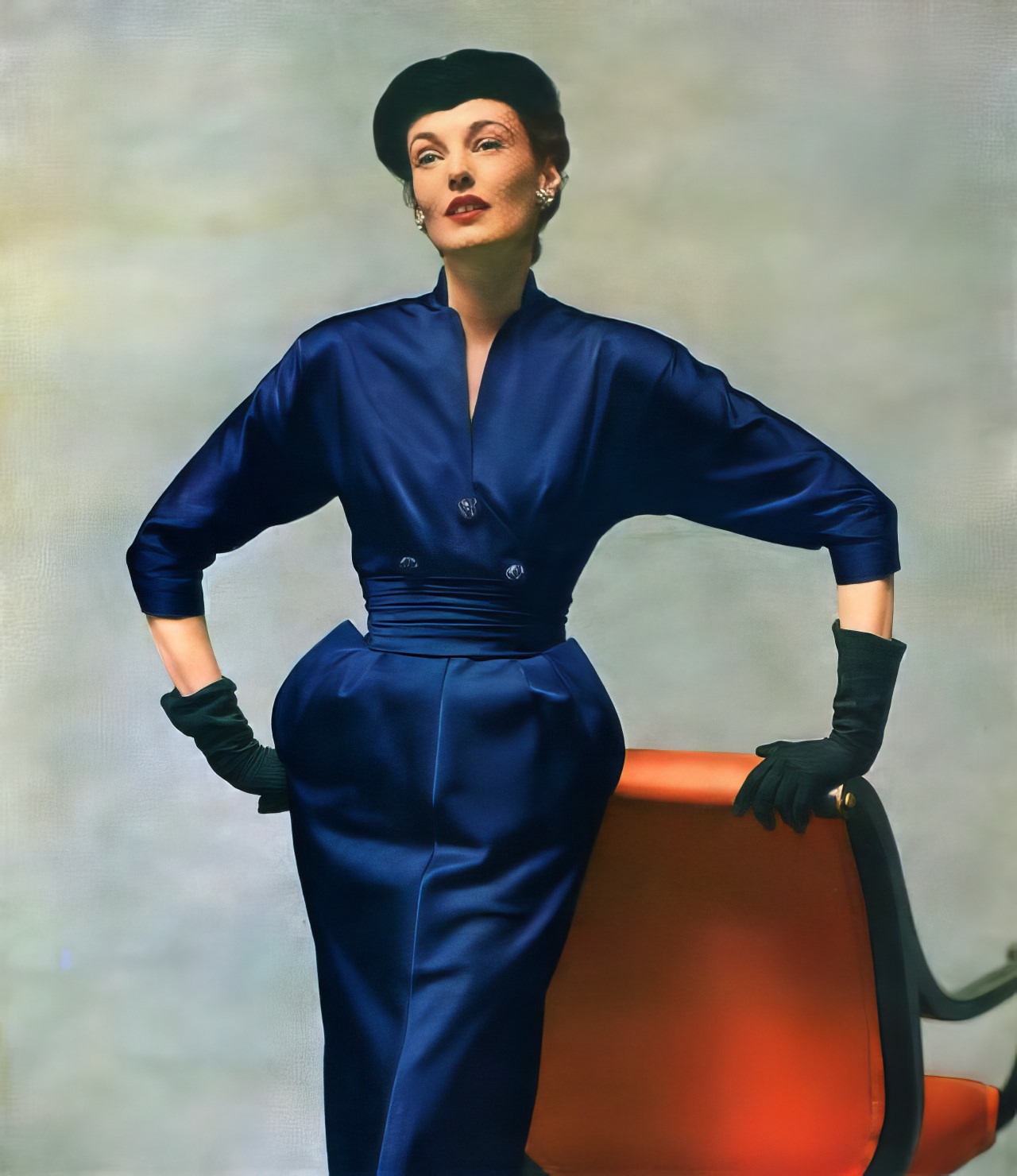 #5 Elise Daniels in a blue rayon satin faille after-dark dress by Adele Simpson, Vogue, September 1, 1951.