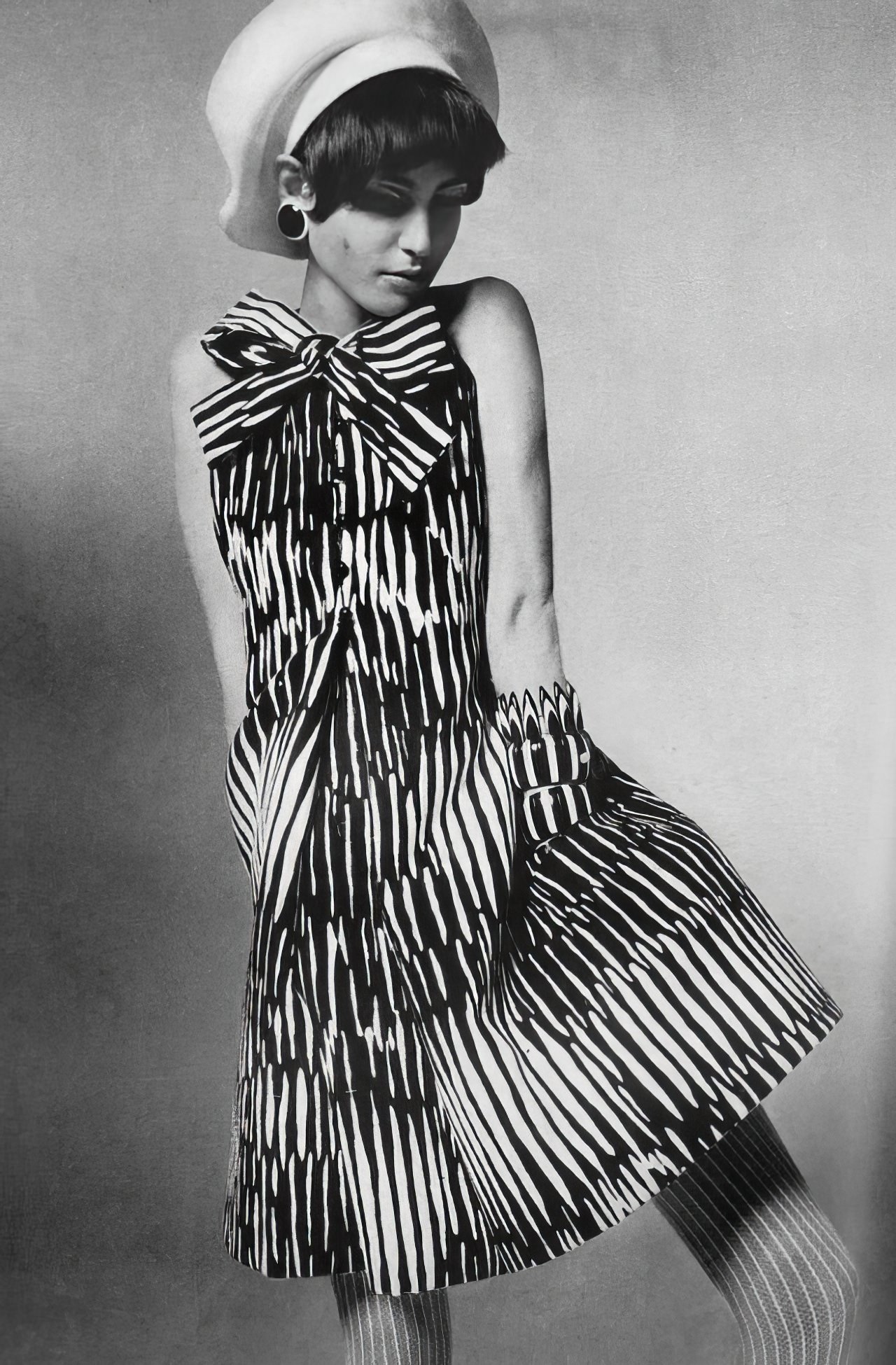 #14 Benedetta Barzini in a black and white dress by Geoffrey Beene, Vogue US, April 1967.
