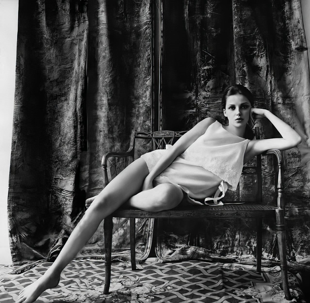 #1 Donna Mitchell in a white batiste dress with pink ribbon by Iris, Vogue, February 1, 1965.