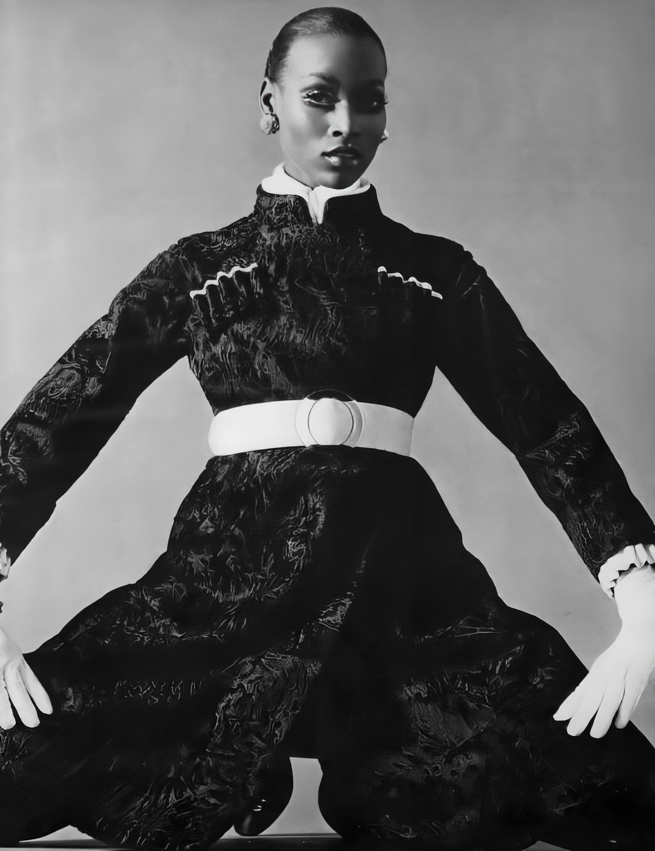 #25 Naomi Simms in a black-dyed Russian broadtail lamb coat by Maximilian, Vogue, November 1, 1968.