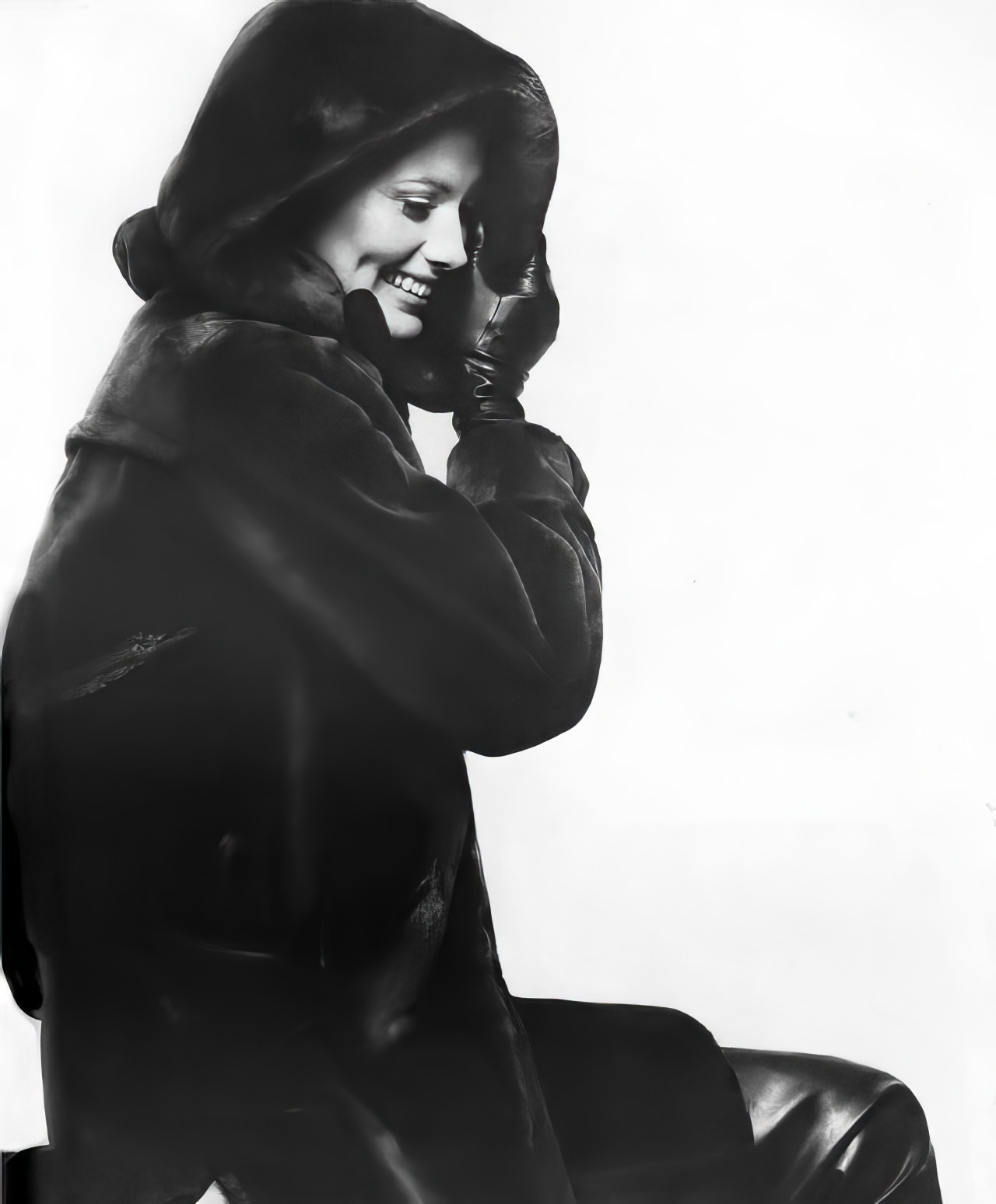 #40 Maud Adams in a hooded Alaska seal fur coat, Vogue, 1969.