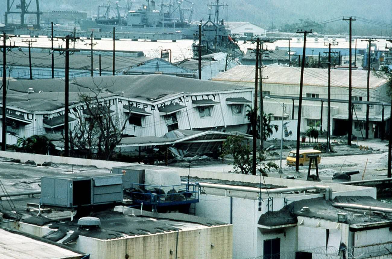 A building collapses under volcanic ash and typhoon rains at SRF Subic Bay