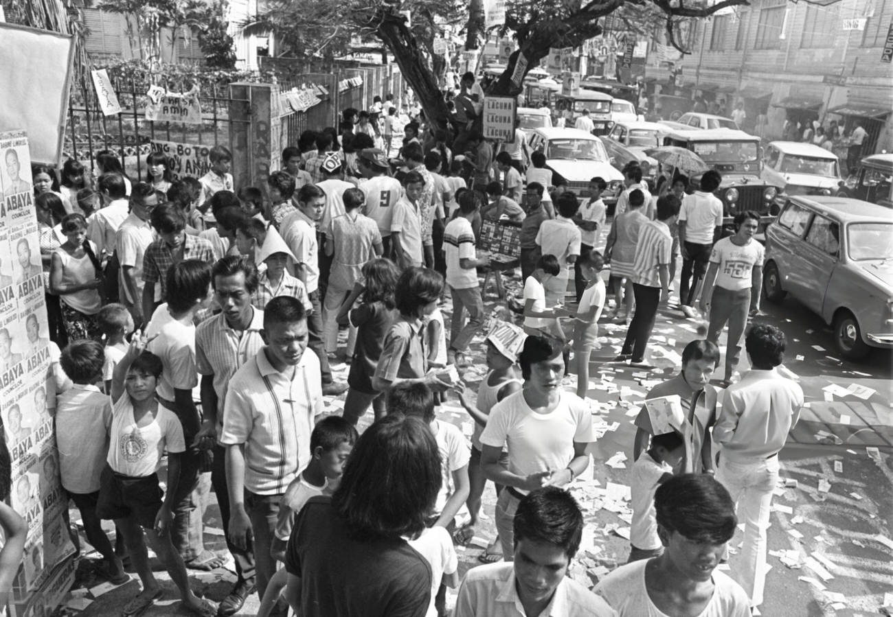 #27 Crowded polling location in Manila during the Philippines’ bloodiest election campaign in its 25-year history, with a potential death toll reaching 200.