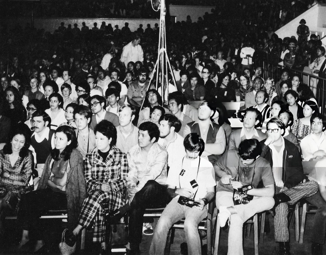 #28 Spectators at Saint Louis University, Baguio City, Philippines, attend an anti-Vietnam War FTA Show in December 1971.