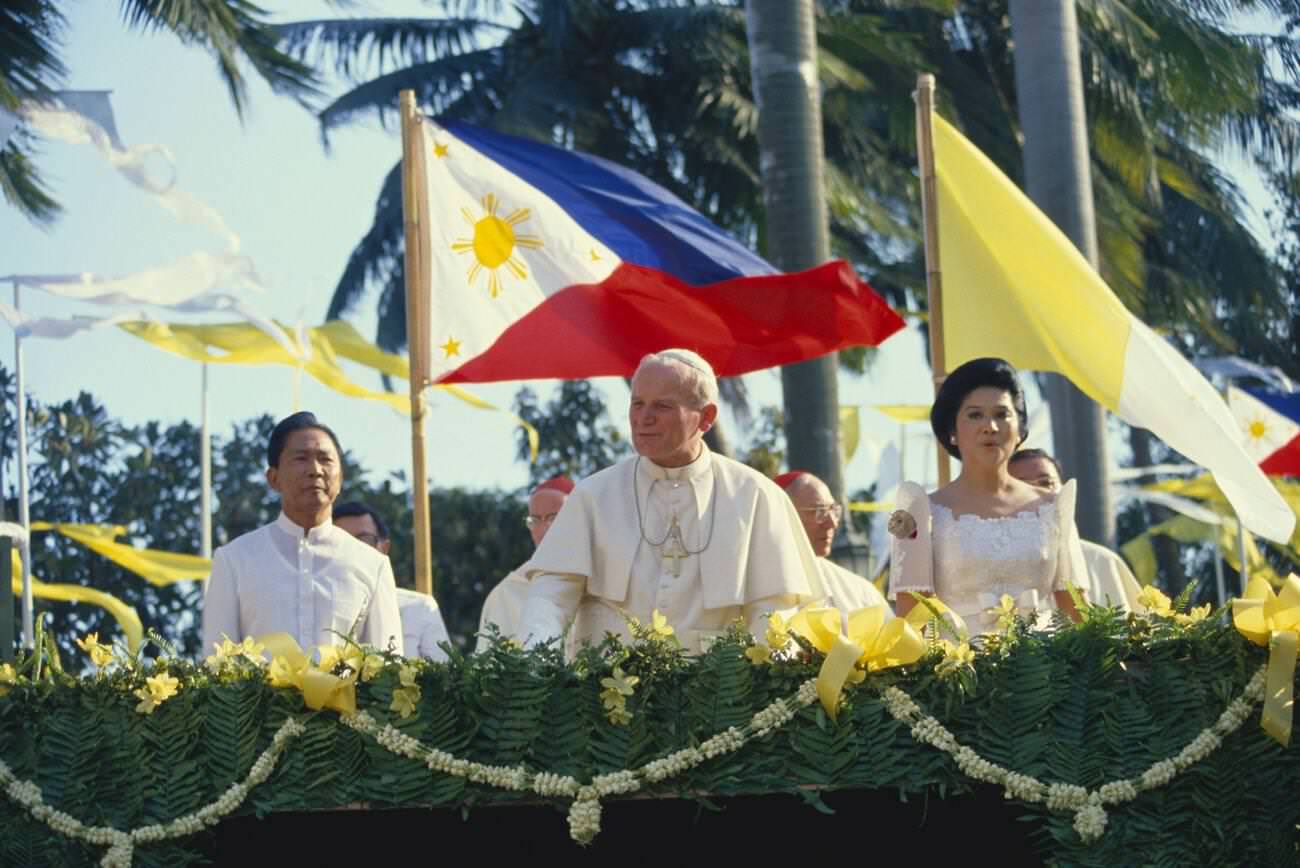 #52 Pope John Paul II with Ferdinand and Imelda Marcos during his 1981 visit to the Philippines.