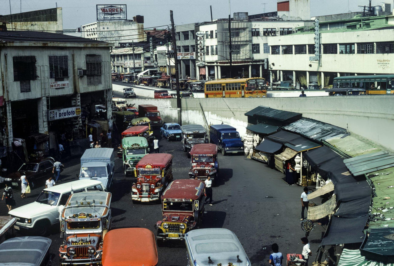 #61 Jeepneys line a street in Quiapo district, Manila, Philippines, in July 1985.