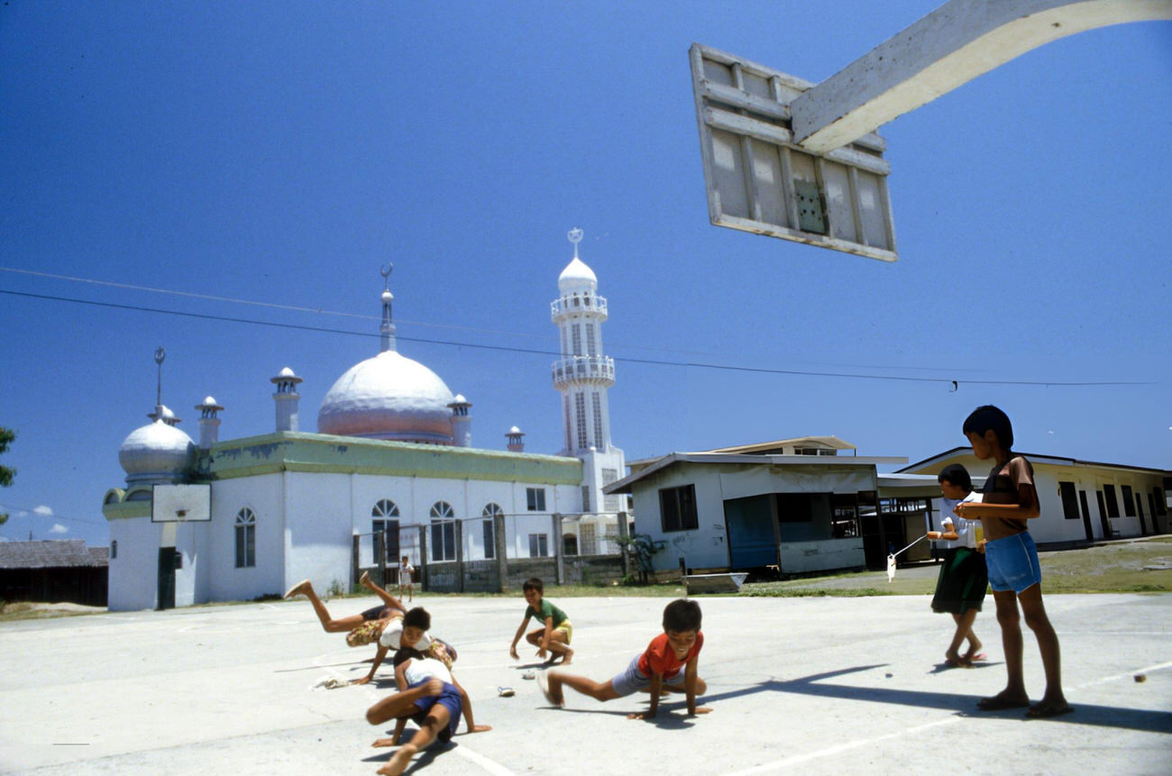 #71 Children dance hip-hop near a mosque in the Philippines, June 1987.