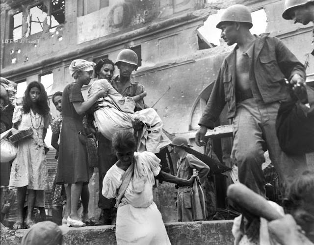 #1 Filipino women rescued by American soldiers, Intramuros, Manila, Philippines, March 1945