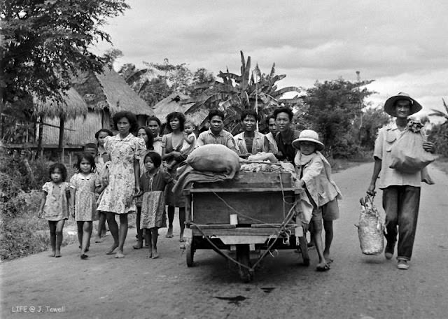#10 Filipino citizens fleeing the fighting, Manila, Philippines, February 1945