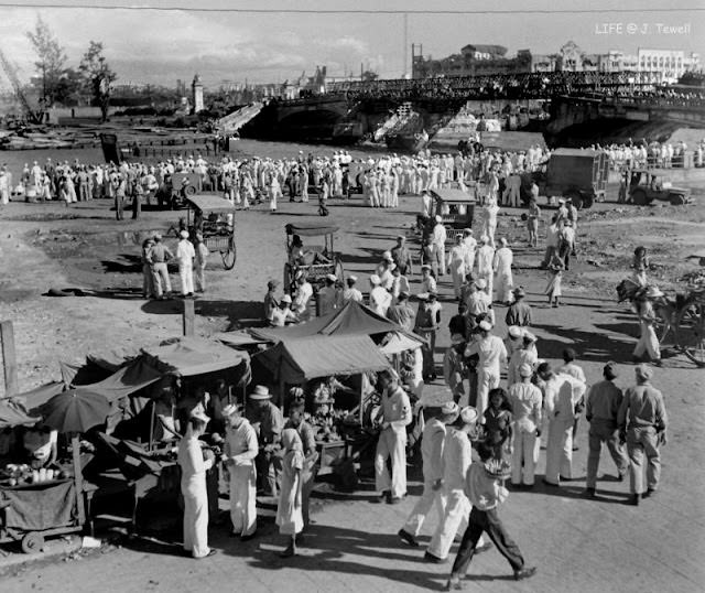 #2 American sailors on the north bank of the Pasig River east of the Jones Bridge, Manila, Philippines, September 1945