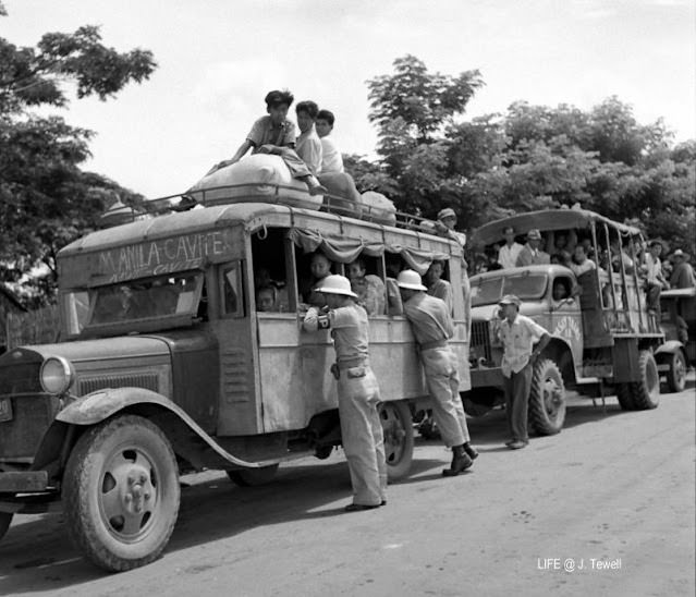 #23 Manila to Cavite bus being checked by Military Police, September 1945