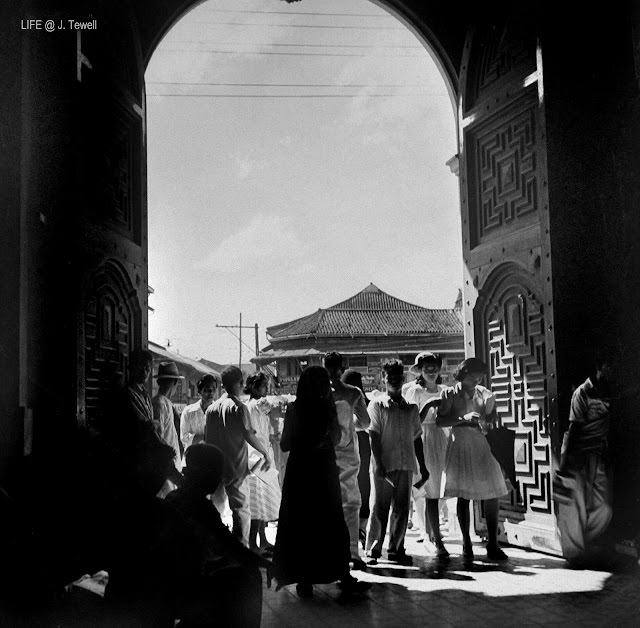#35 Inside Quiapo Church looking out just before the bombing and invasion by the Japanese late 1941. Manila, Philippines.