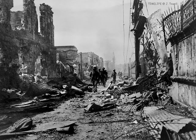 #58 American soldiers entering Intramuros. Manila, Philippines, March 2, 1945.