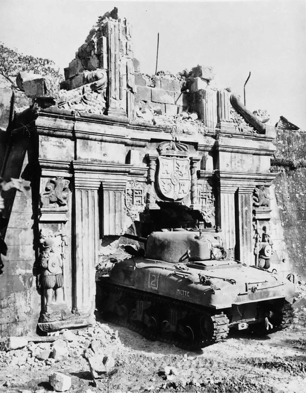 #74 A U.S. Army M4 Sherman tank enters Fort Santiago through an enlarged gate during the Battle of Manila, 1945.