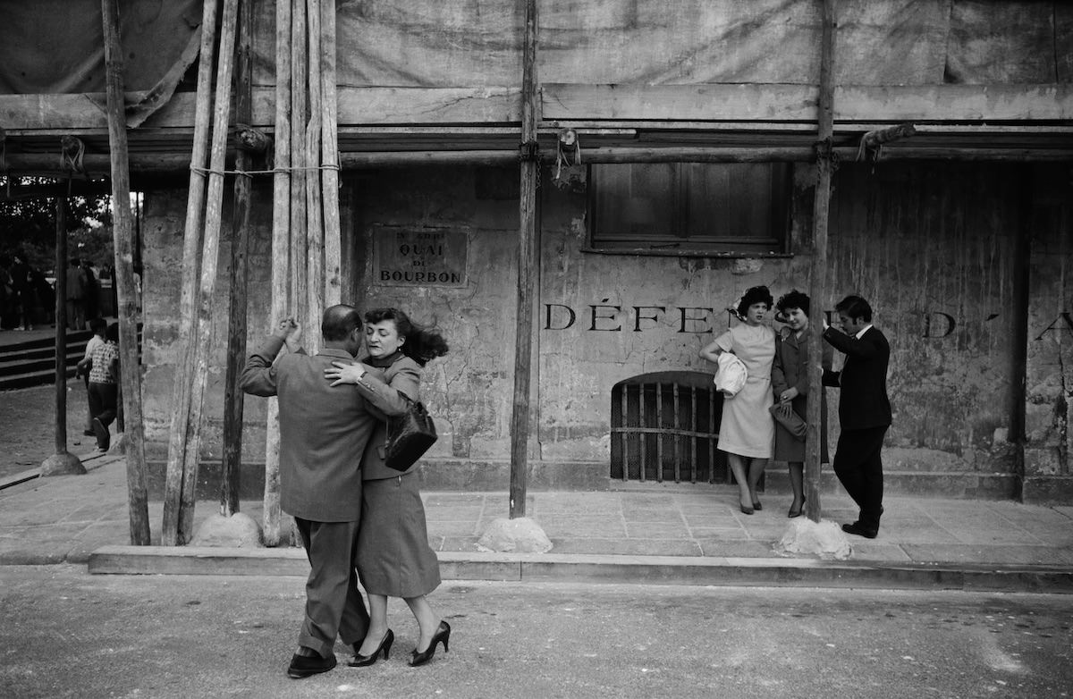 #18 Dancing scene on the Ile Saint-Louis in Paris, taken during the ‘Quatorze Juillet’ [Bastille Day] celebration in 1958.