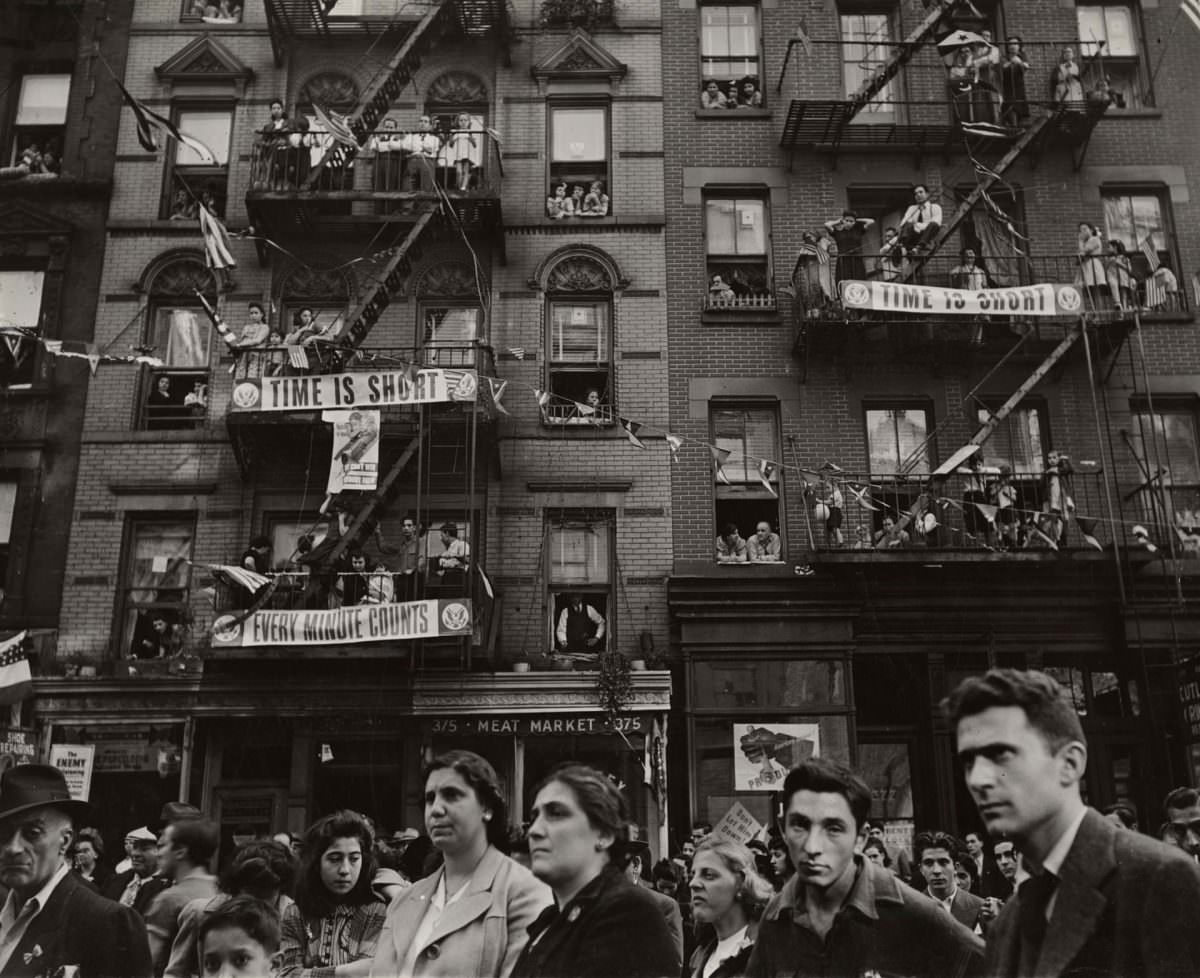 #18 ‘Time Is Short’ in Broome Street, Little Italy, NYC, 1942.