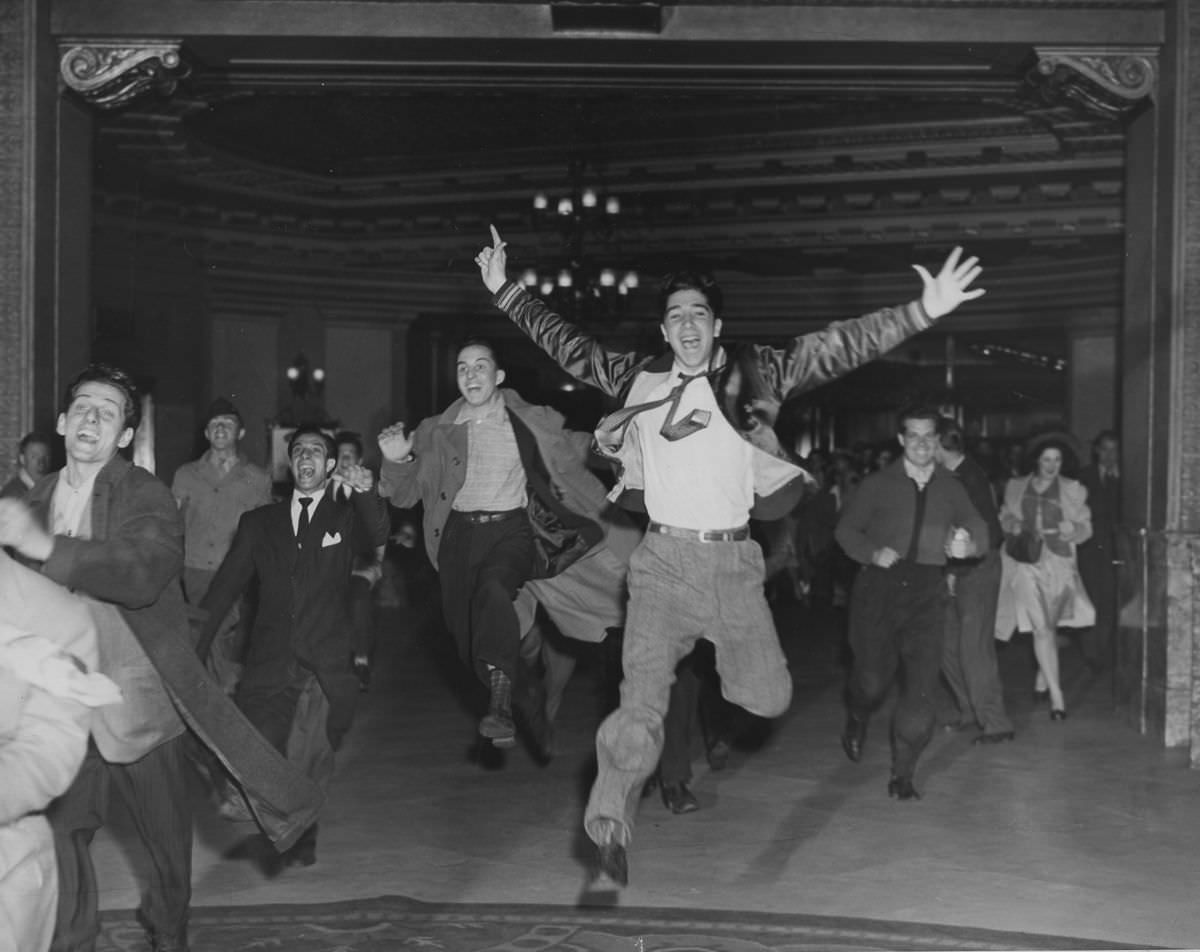 #2 A crowd at a boxing match, 1943.