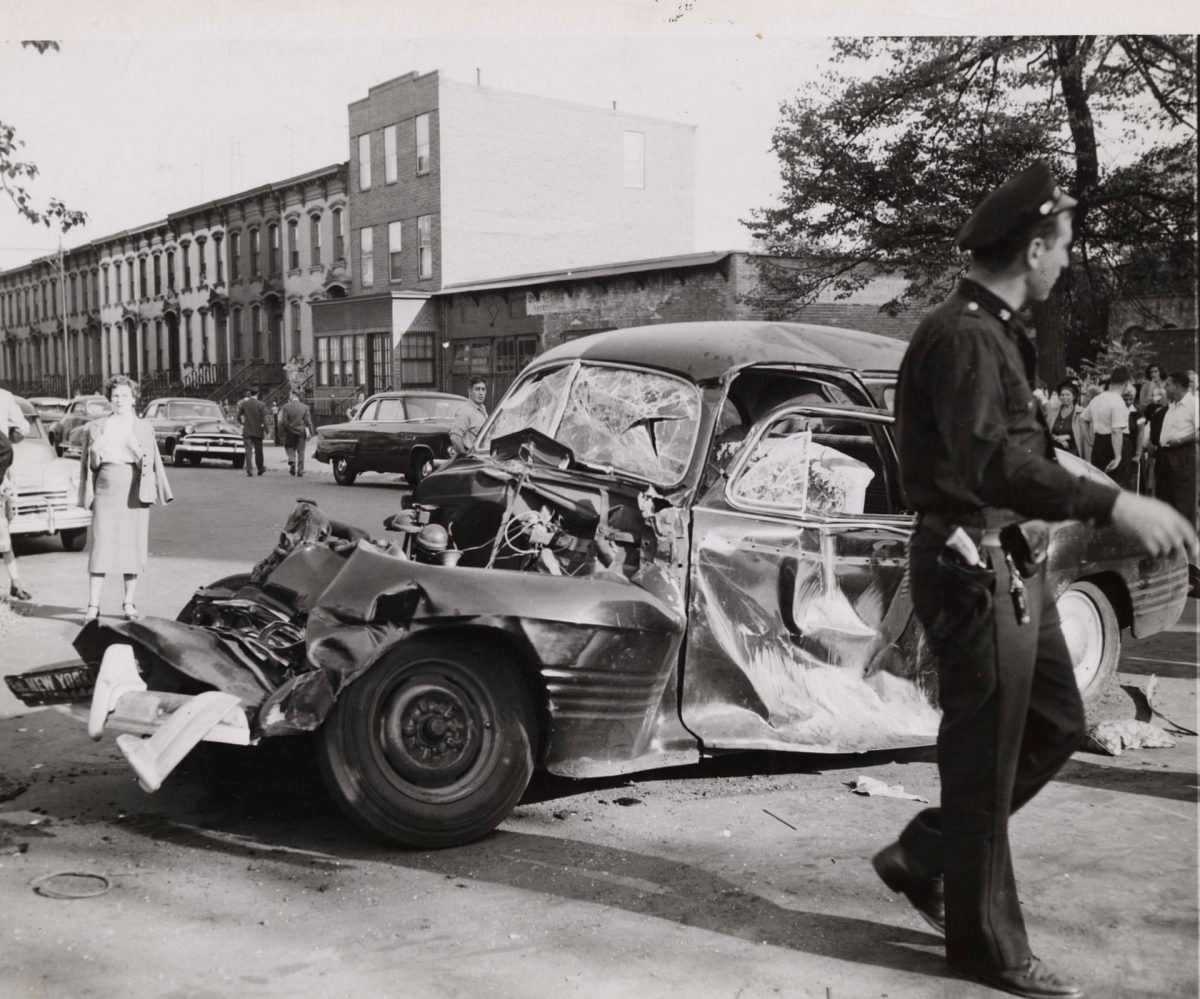 #28 A car and truck collide in Brooklyn, 1947.