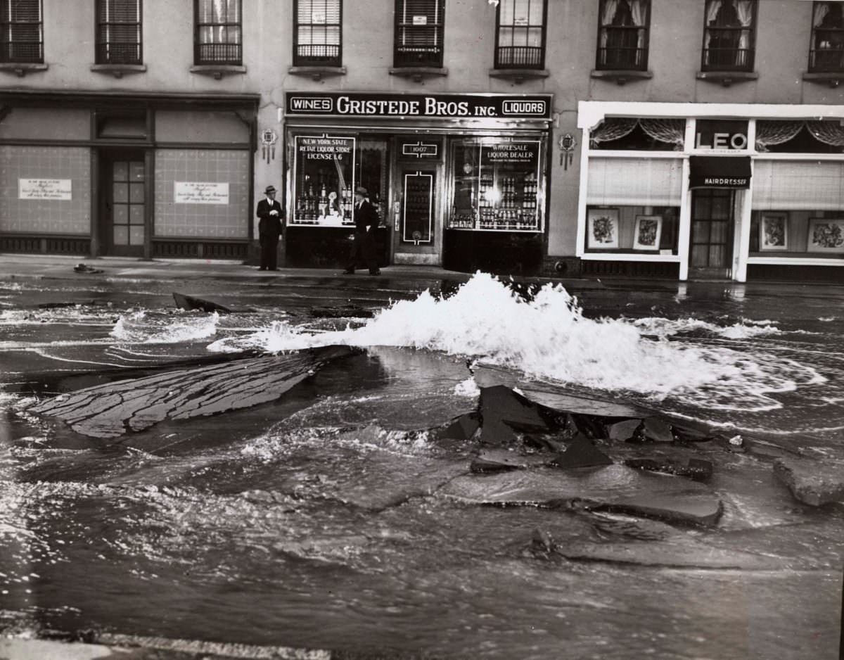 #31 Water main burst uproots Madison Avenue, 1945.