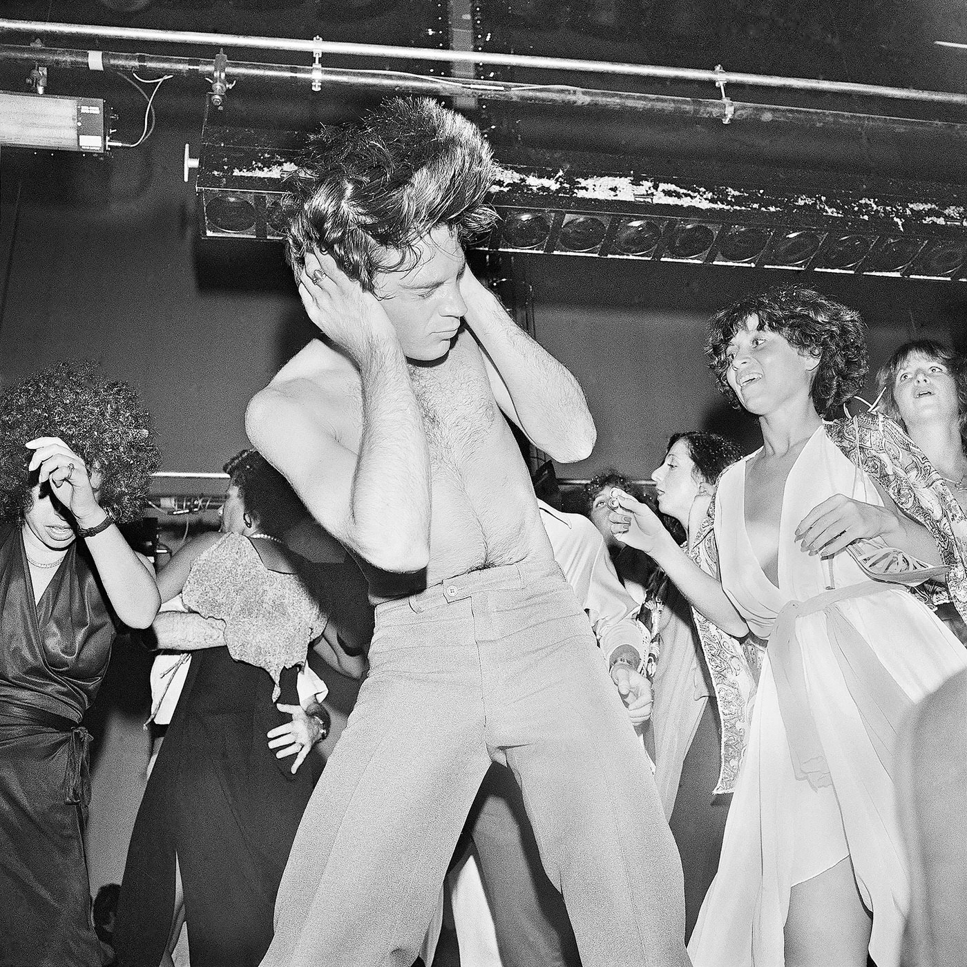 #5 “Holding Head as Hair Flies While Dancing” with Judi Jupiter (Studio 54, New York; July, 1977).