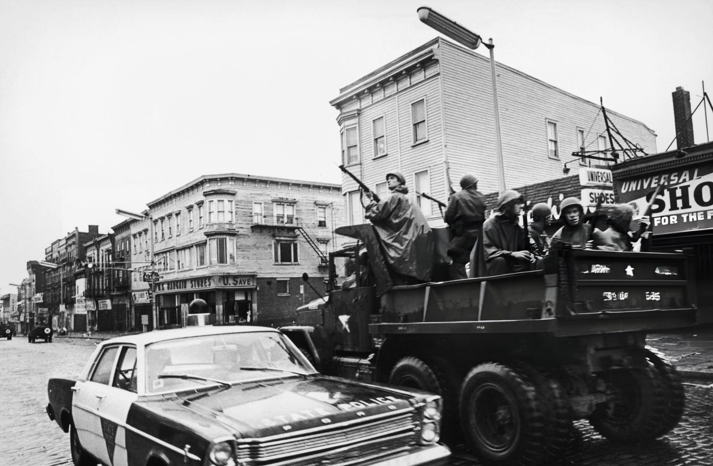 #3 Members of the National Guard join the local police in searching for rooftop snipers