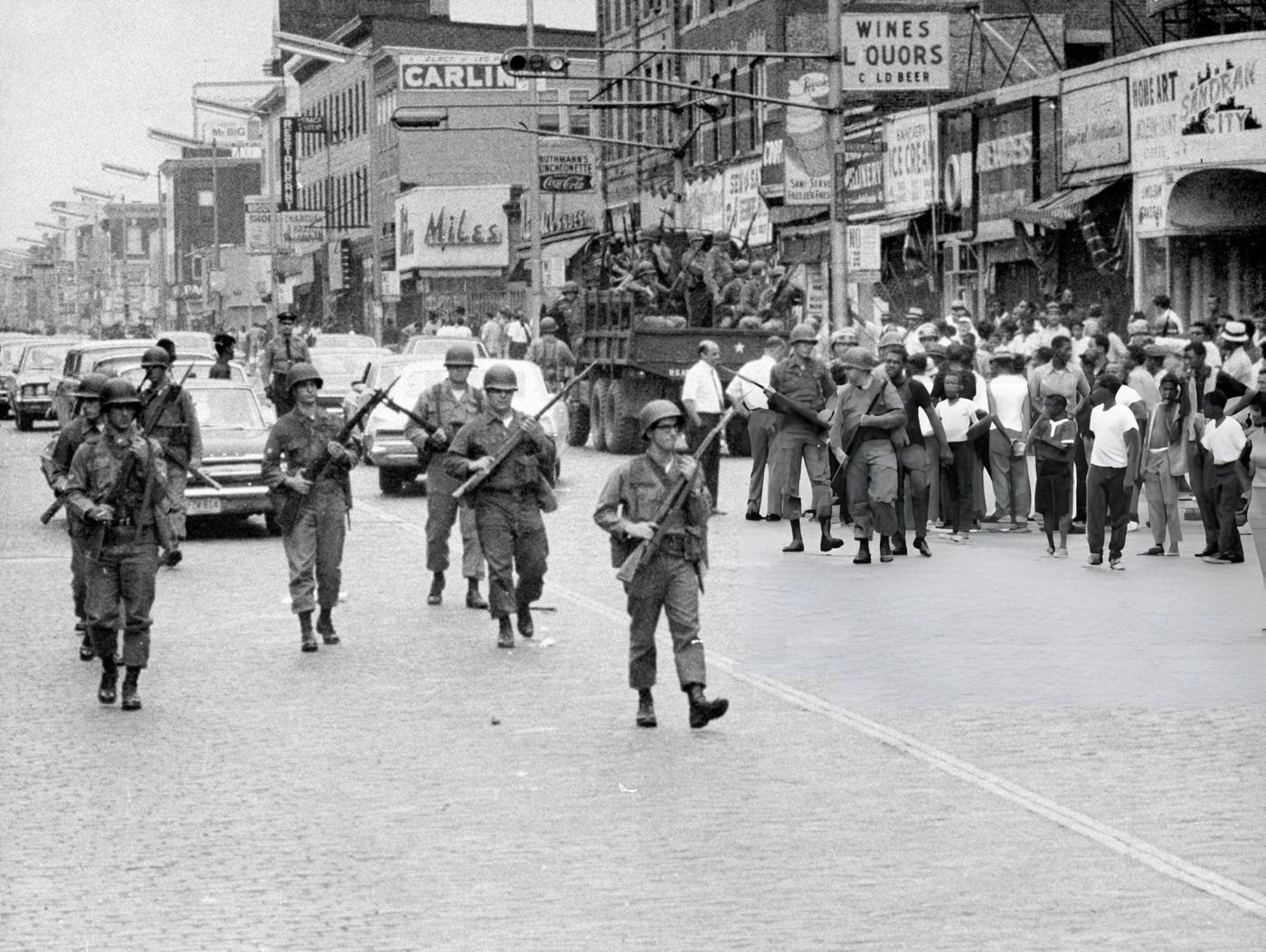 #27 National Guard troops start to deploy into Springfield Ave., the scene of heavy rioting, 1960s.