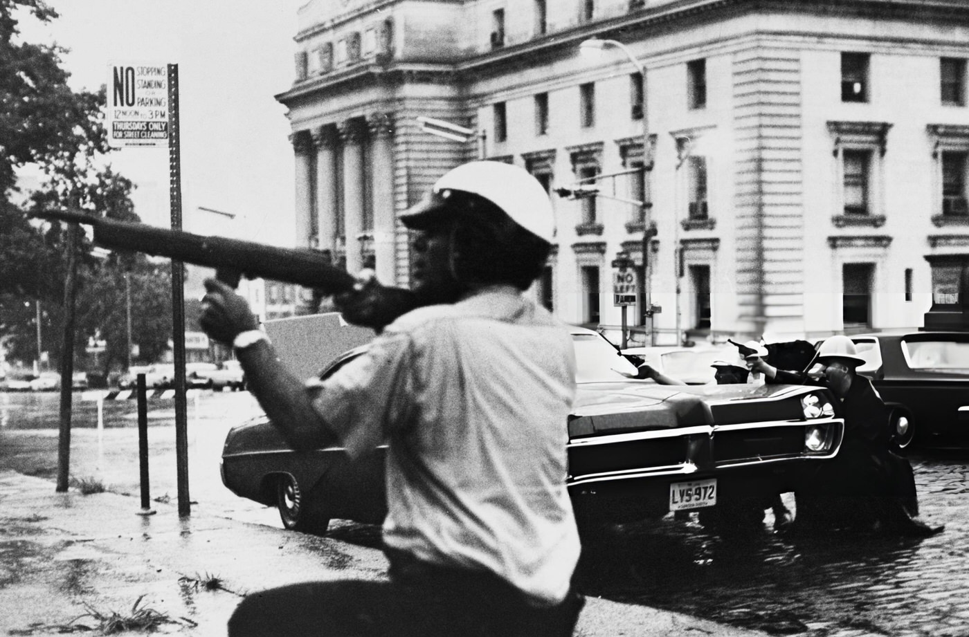 #40 Newark police officers and state troopers exchange fire with a sniper