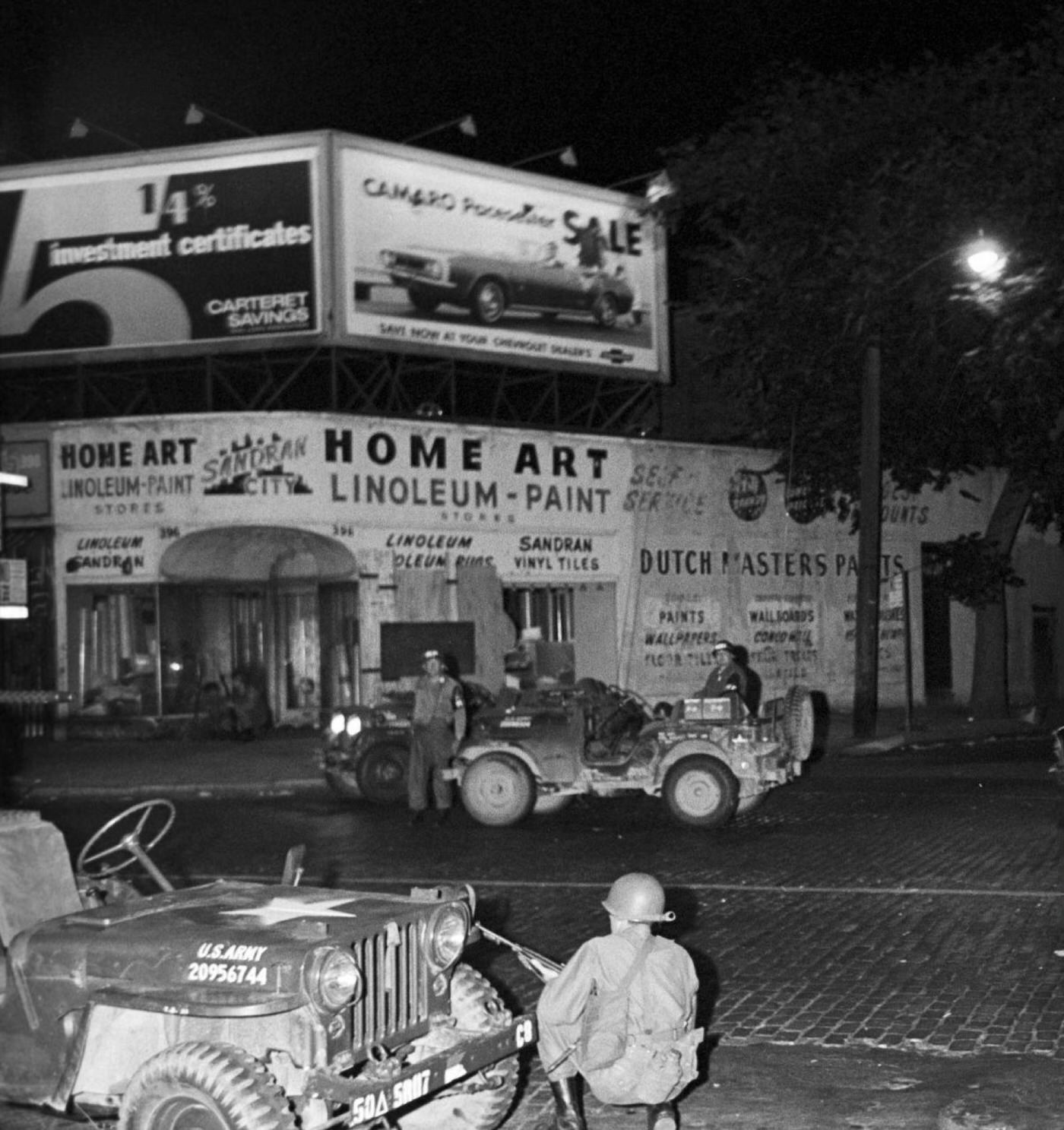 #53 National Guard soldiers in ambush behind a jeep armed with a light machine gun