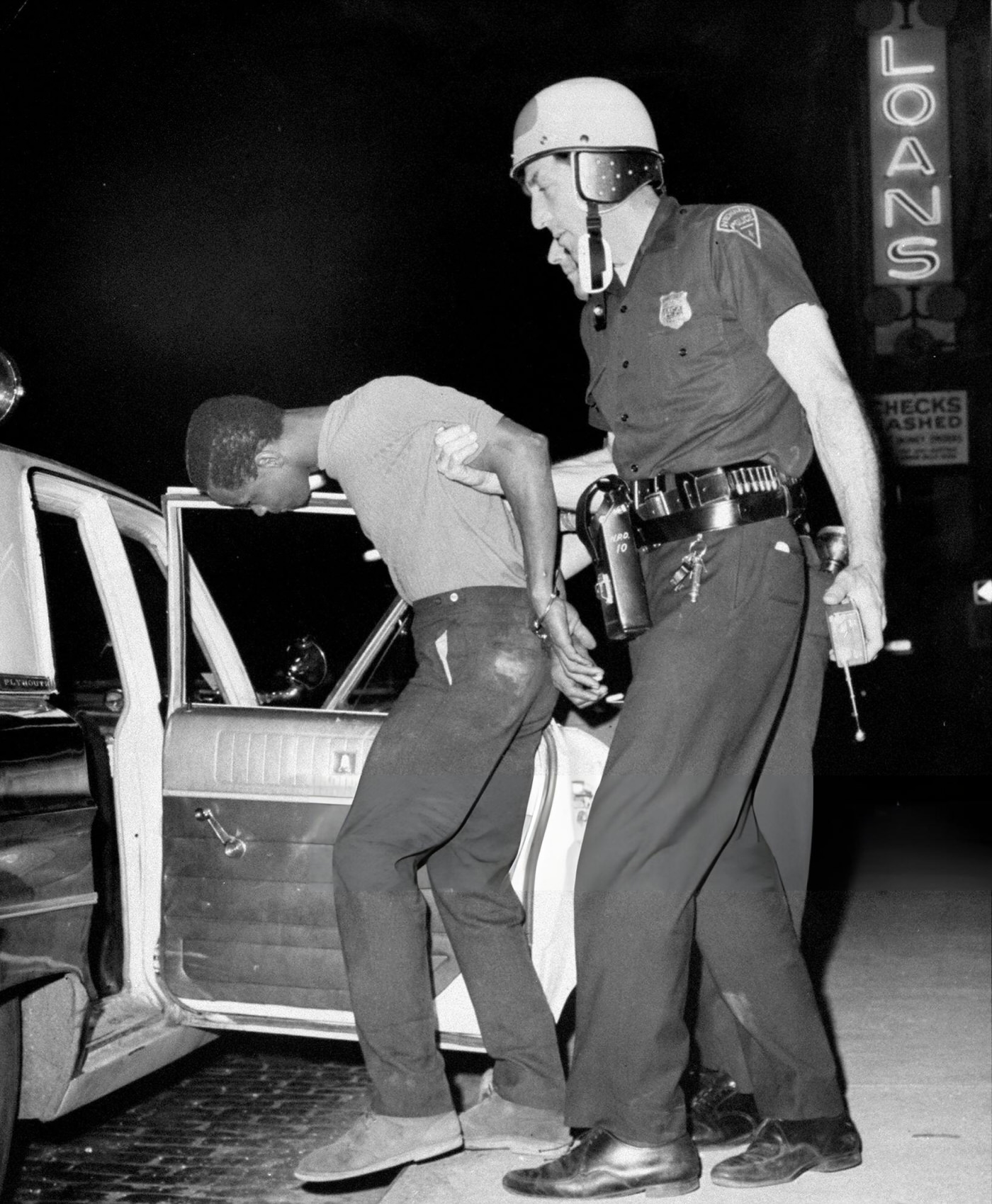 #75 Newark Police arrest a looter at Springfield Ave. and Mercer St. during riots