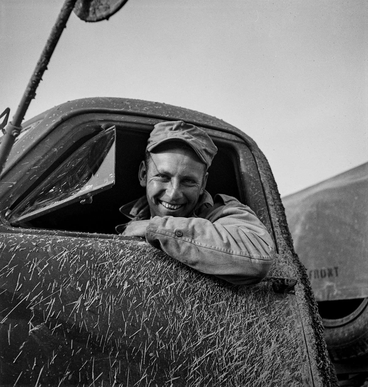 #3 Private Zeno W. Muhl of Baltimore, Maryland. He owns his own dump truck in civilian life.