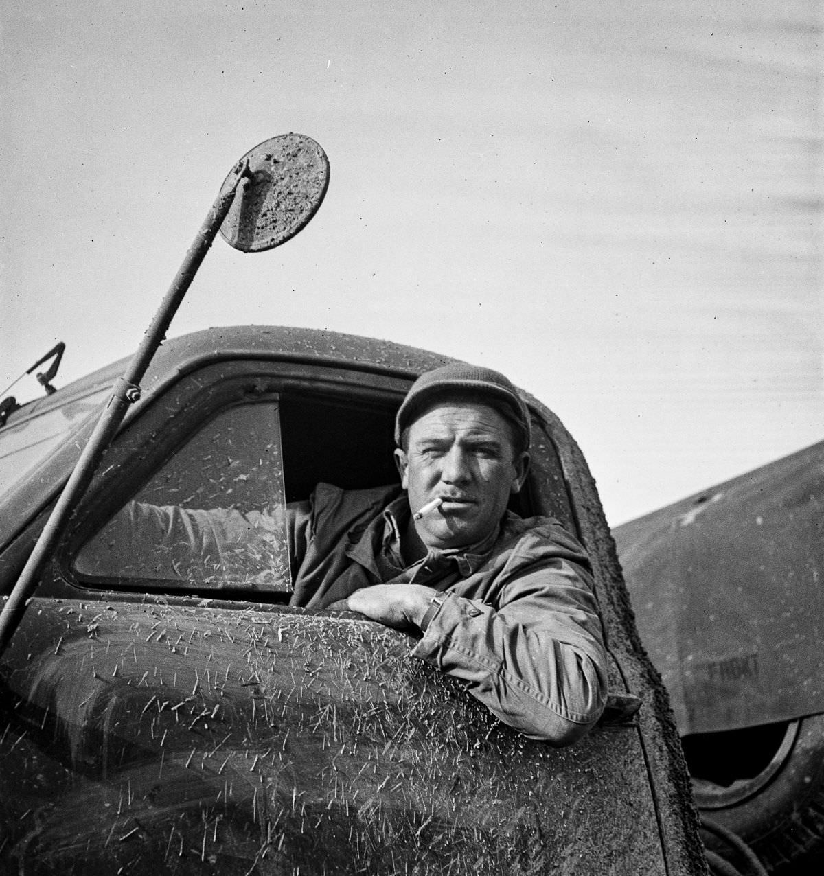 #7 Private First Class Raymond E. Waller of Dayton, Ohio, a trucker in civilian life.