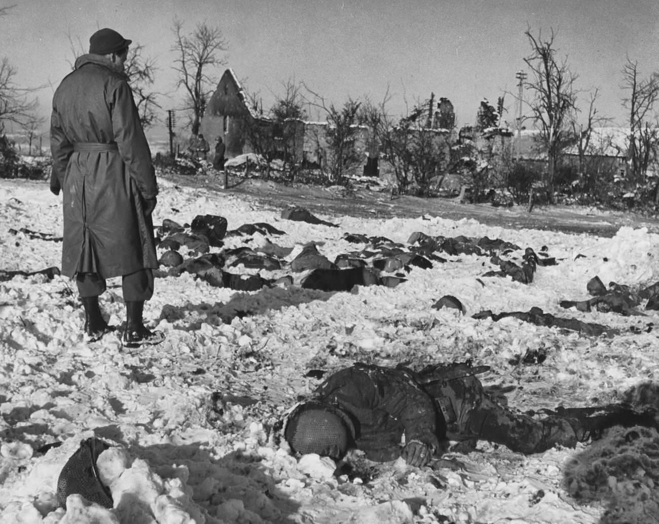 #13 Approximately 70 members of Battery B killed after being captured at the beginning of the Battle of the Bulge, 1944.