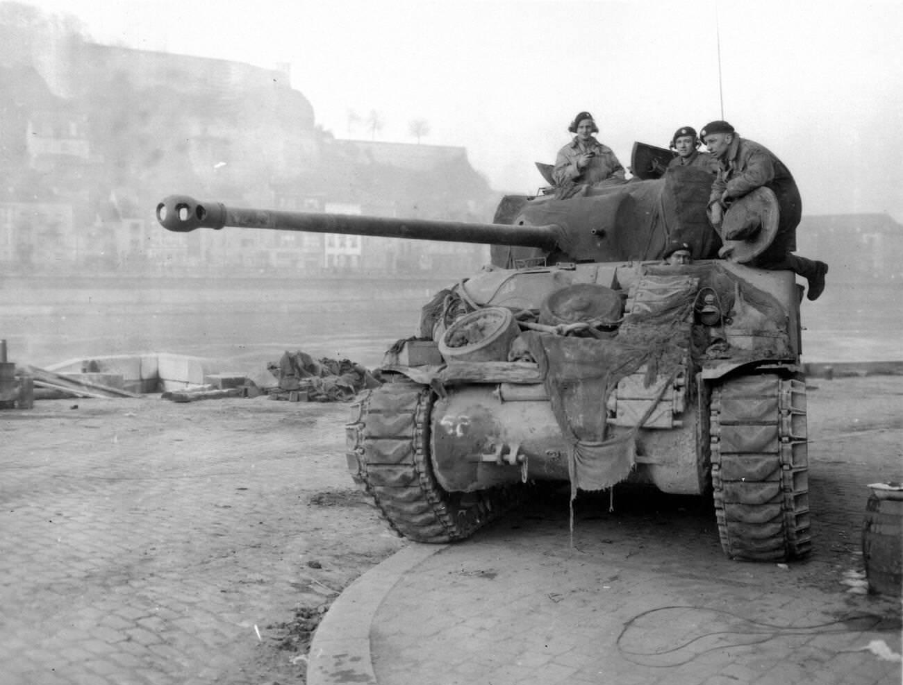 #38 British Sherman Tank known as the Firefly patrolling the Meuse at Namur, 1944.