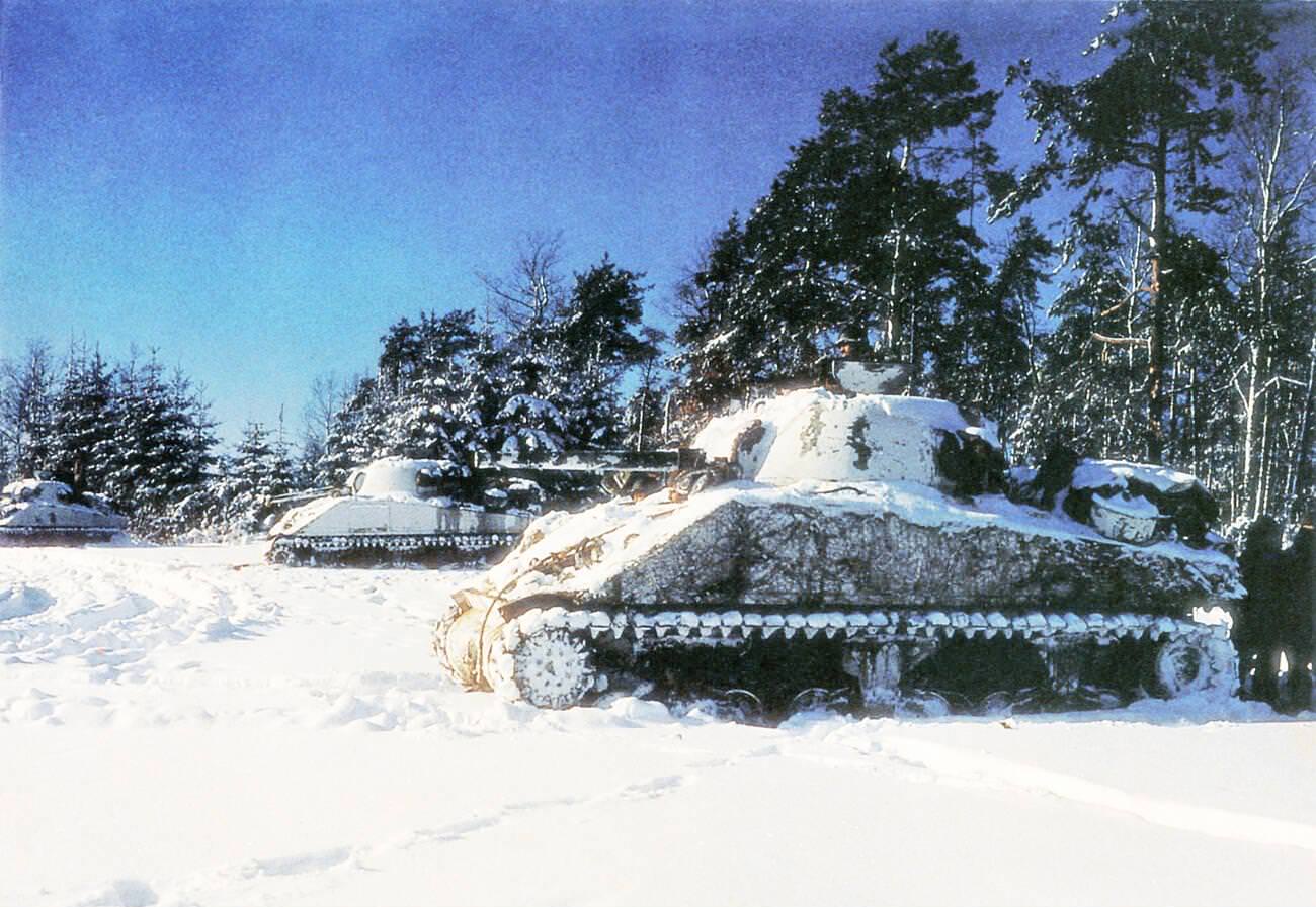 #4 Three American M4 Sherman tanks near St. Vith during the Battle of the Bulge, 1944.