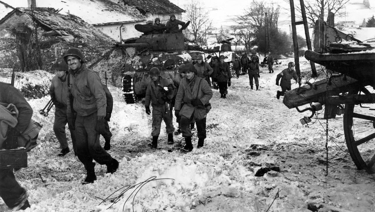 #67 American troops in Belgium during the Battle of the Bulge, 1945.