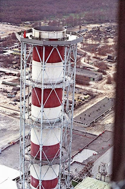 #17 To mark the end of the clean-up operation atop reactor 3, the authorities ordered three men to attach a red flag to the summit of the chimney.