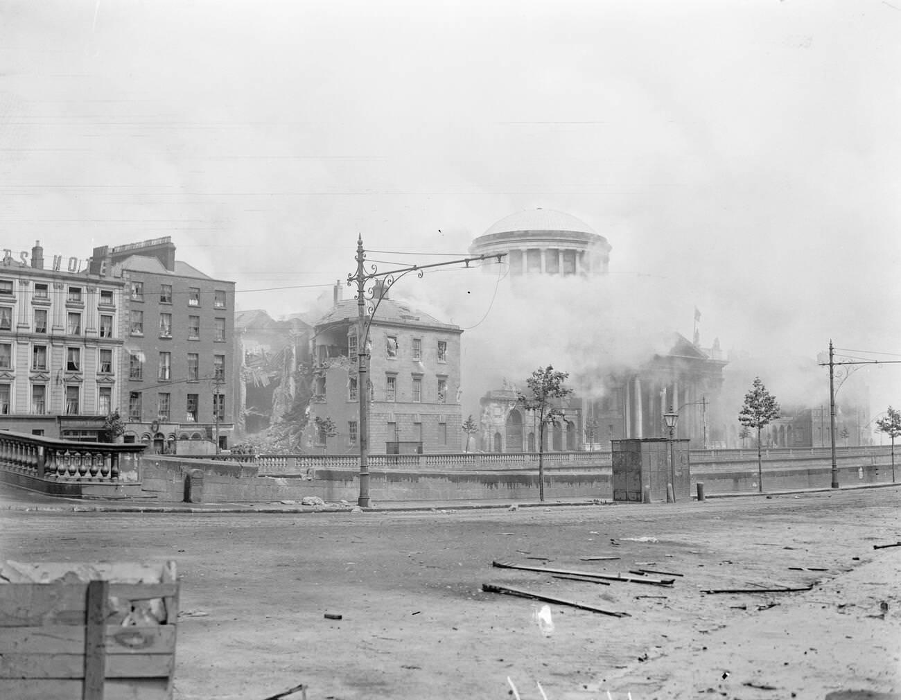 #1 The Four Courts in Dublin ablaze after an explosion during the Irish Civil War, 1922.