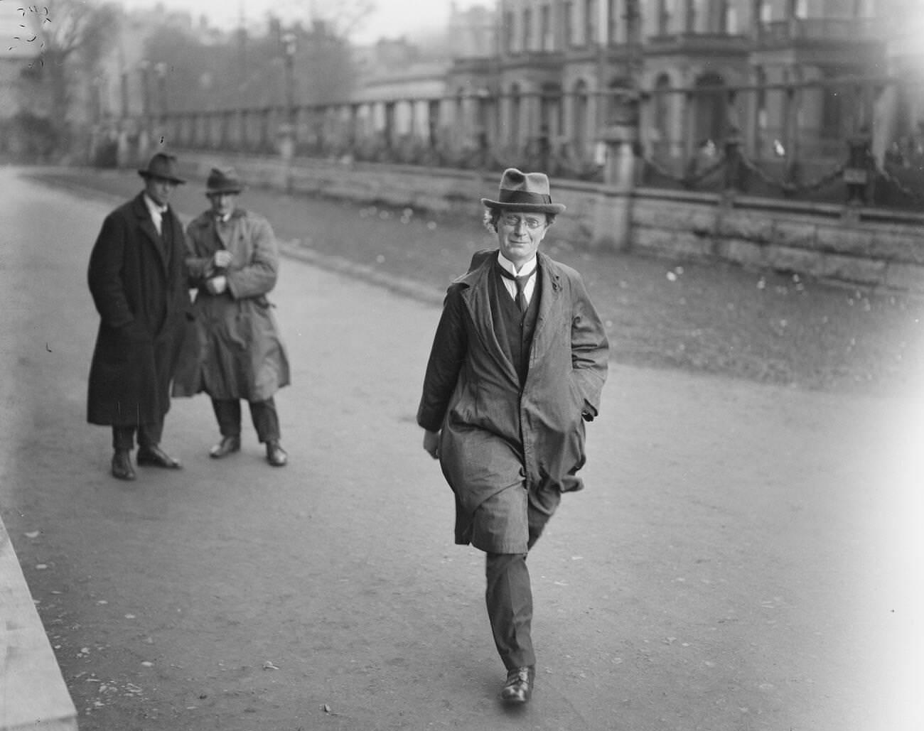#16 The fateful session of the Dail Eireann at the new University College, Dublin with the speaker, Professor John MacNeil arriving, 1921.