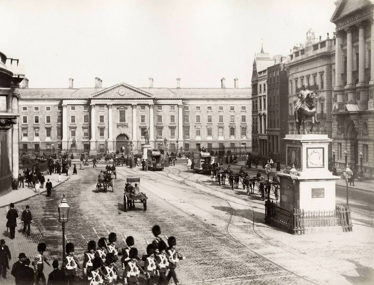 #11 British soldiers marching outside the front gate of Trinity College Dublin, Ireland, 1890s