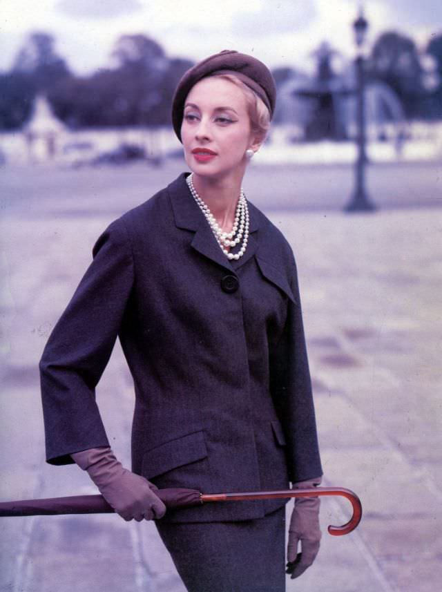 #16 Marie-Thérèse in Balmain’s elegantly tailored flannel suit named “Jolie Madame”, 1956.