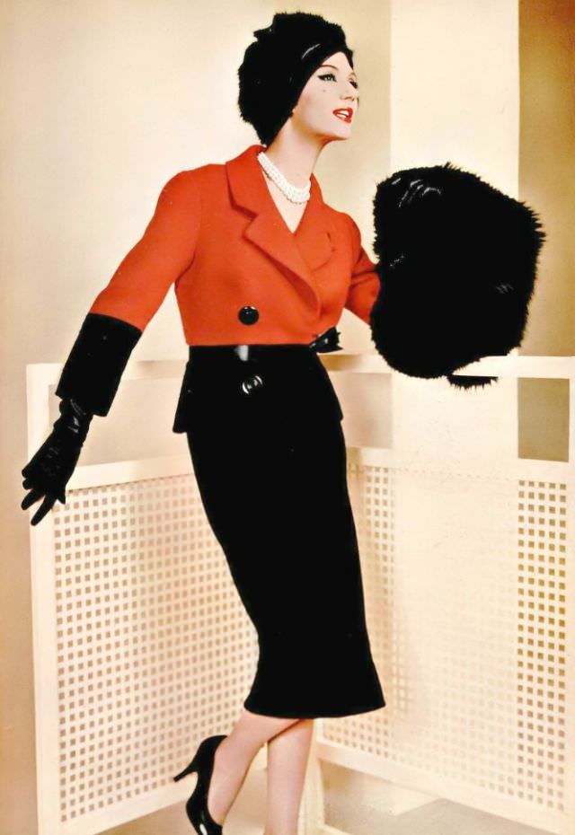#34 Simone d’Aillencourt in a striking red and black wool suit by Pierre Balmain, 1958.