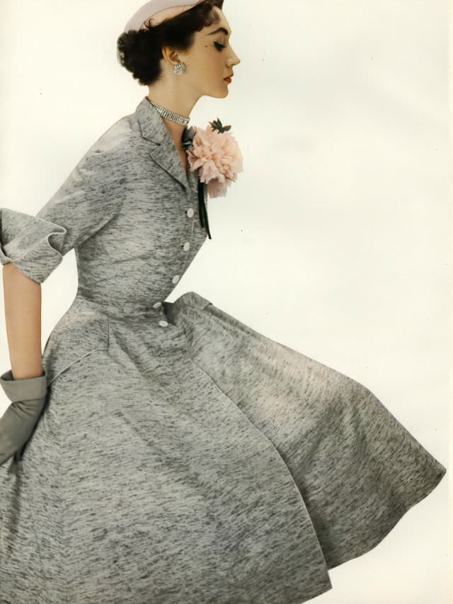#4 Dovima in a redingote of Celanese acetate and silk by Pierre Balmain, 1953.