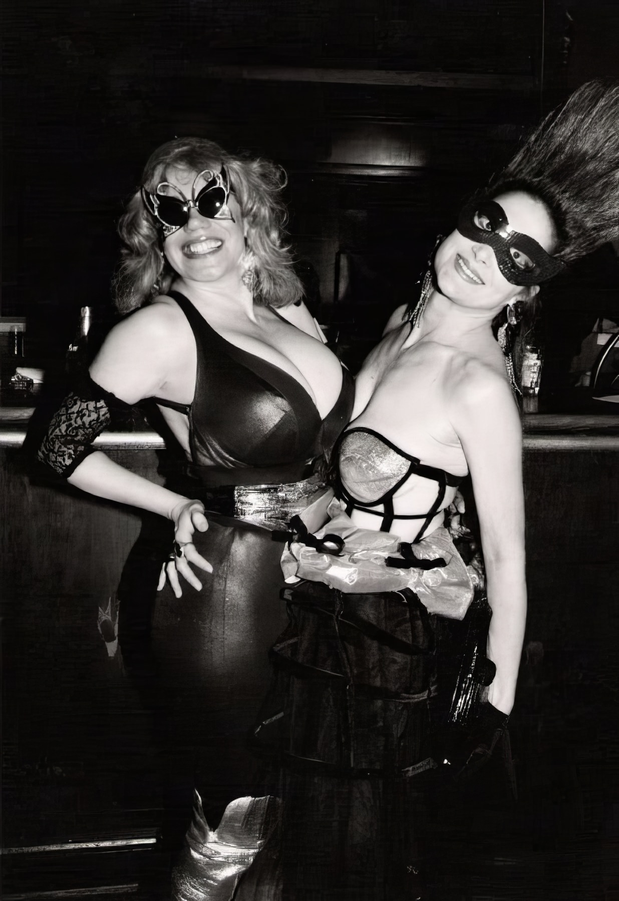 #19 Kitten Natividad, ex-wife of Russ Meyer, and Diane H. busting out at the Stock Exchange nightclub.