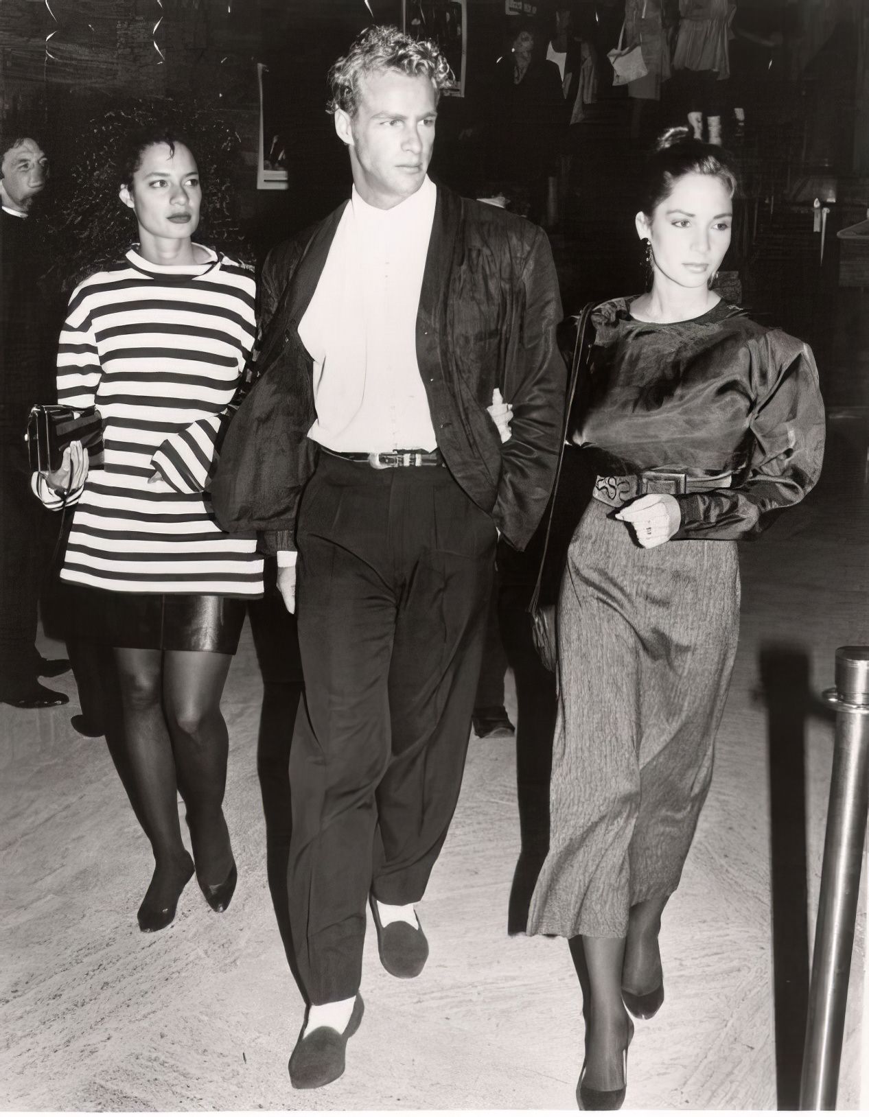#41 Actor and model Steve Lyon with two friends af the Stock Exchange nightclub.