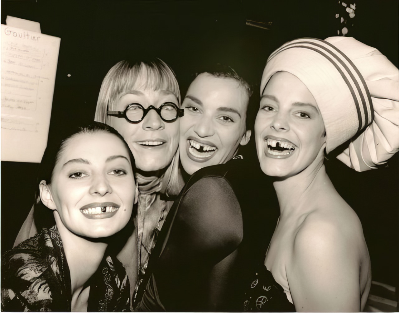 #43 The models (and stylist in glasses) having fun after a fashion show.